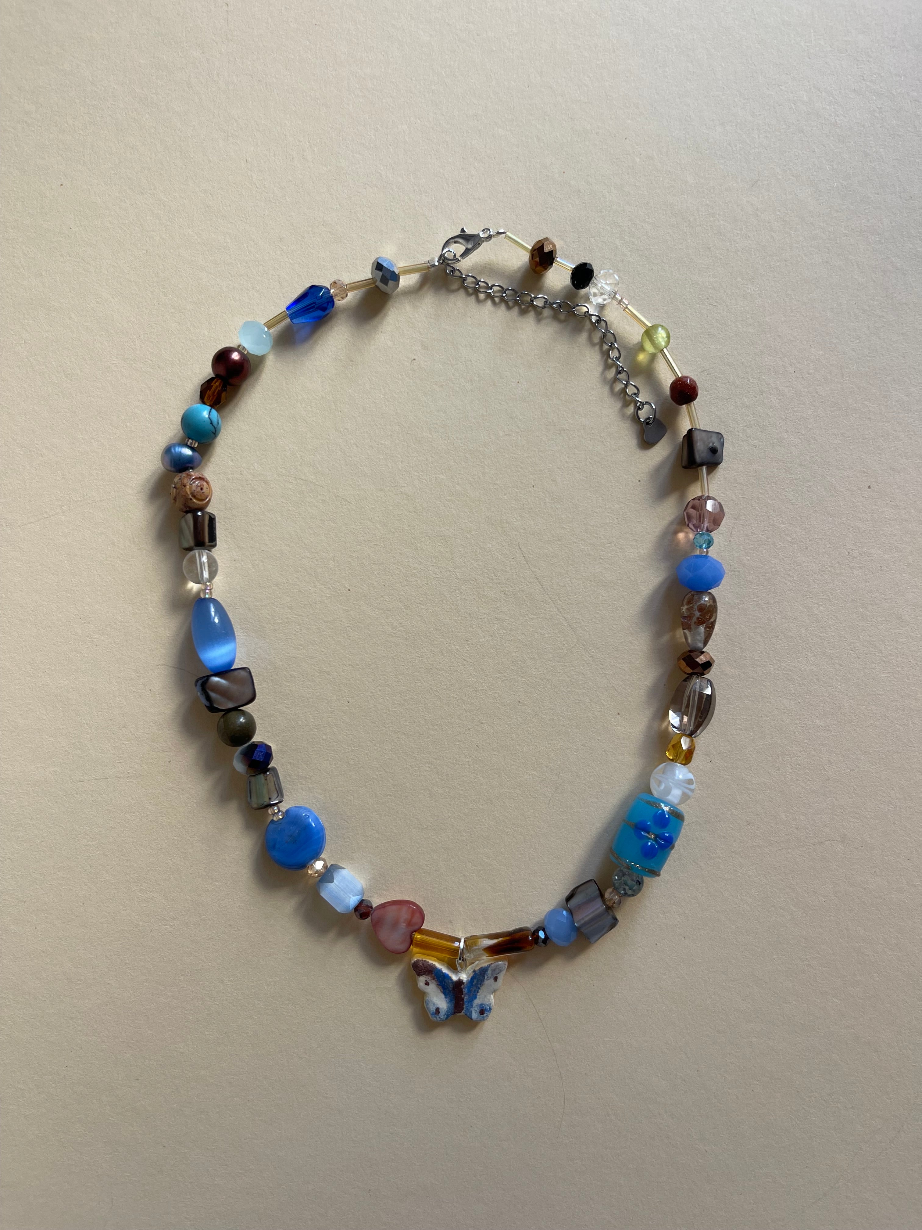 Blue/brown butterfly necklace