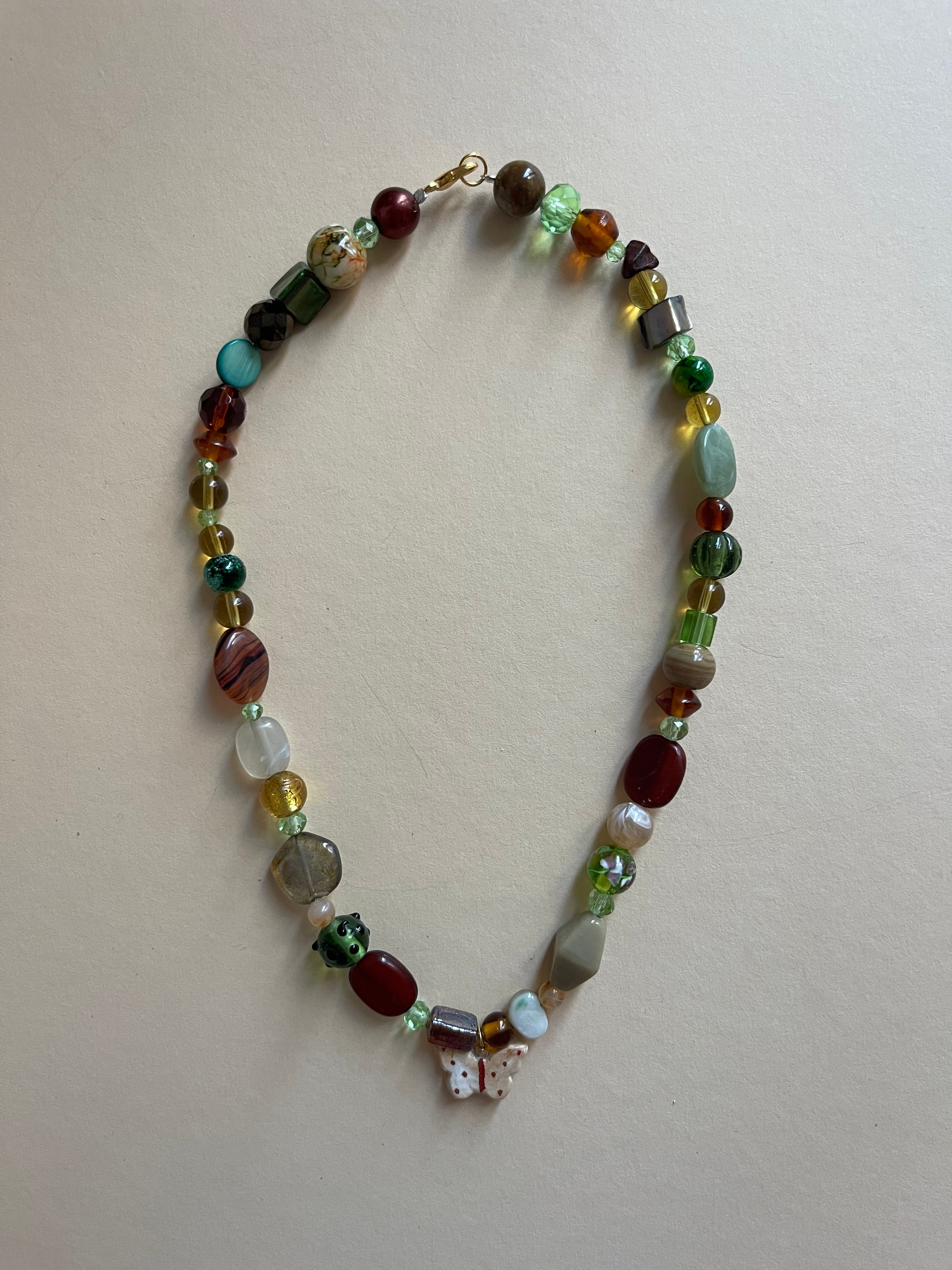Green butterfly necklace
