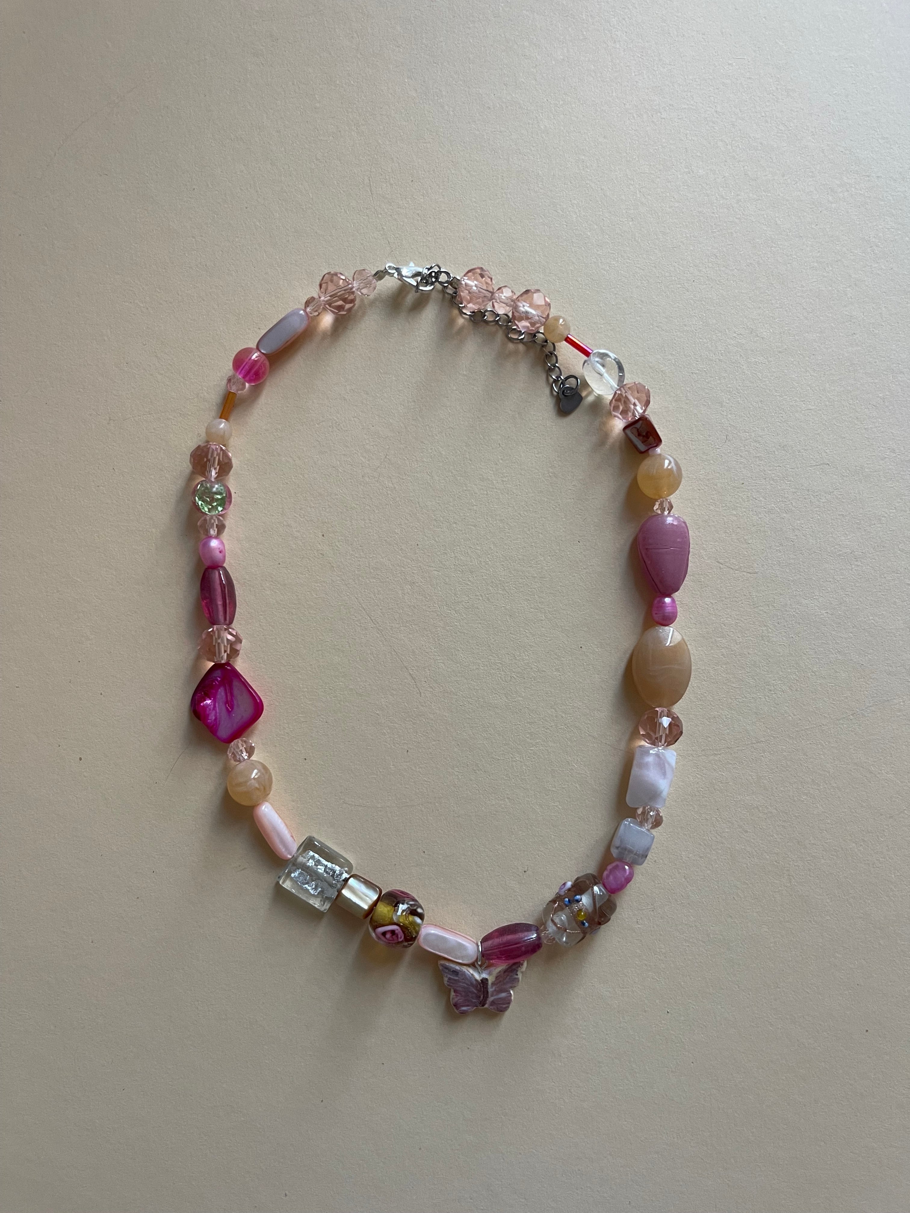 Pink tone butterfly necklace