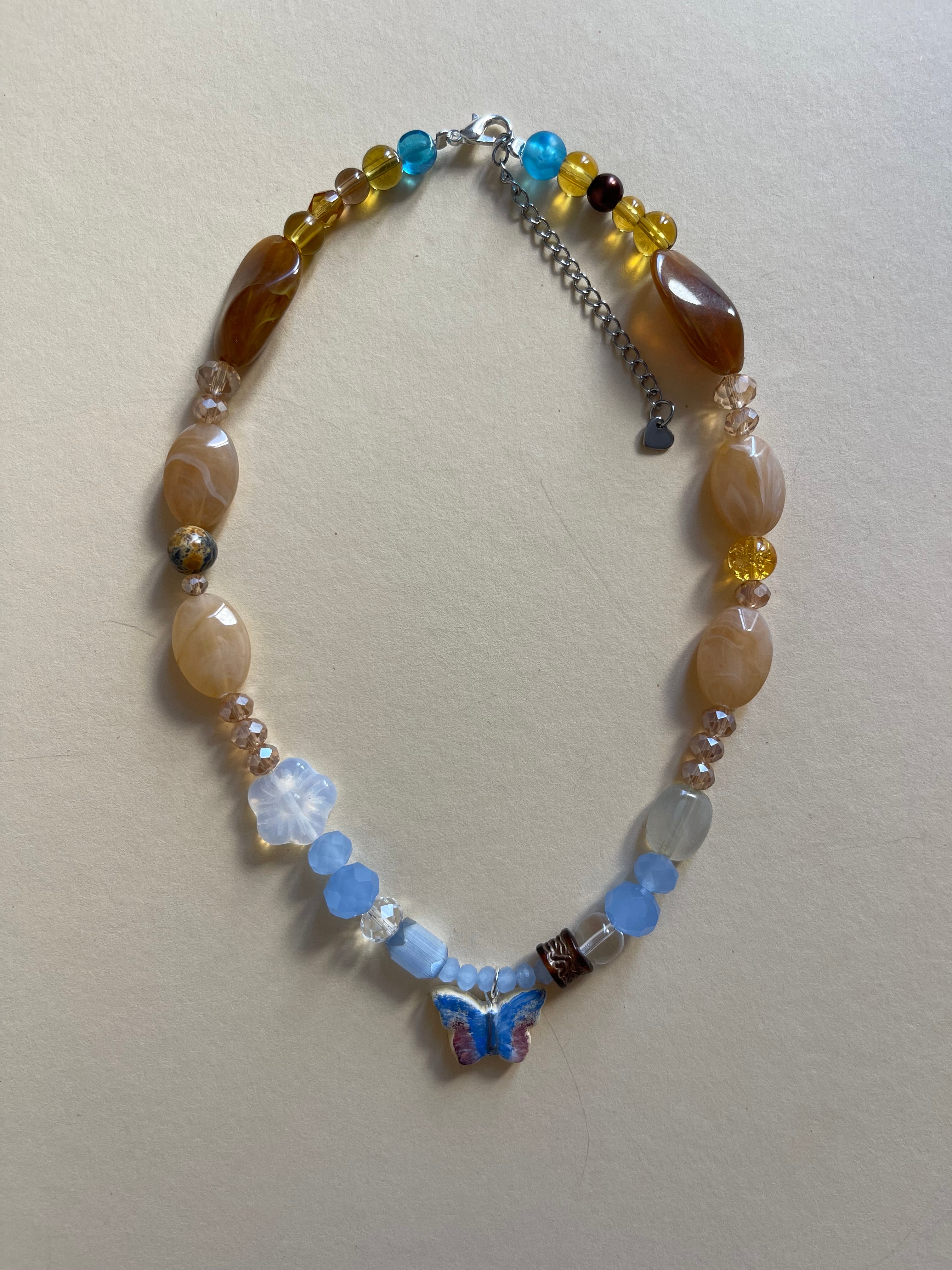 Blue/gold butterfly necklace