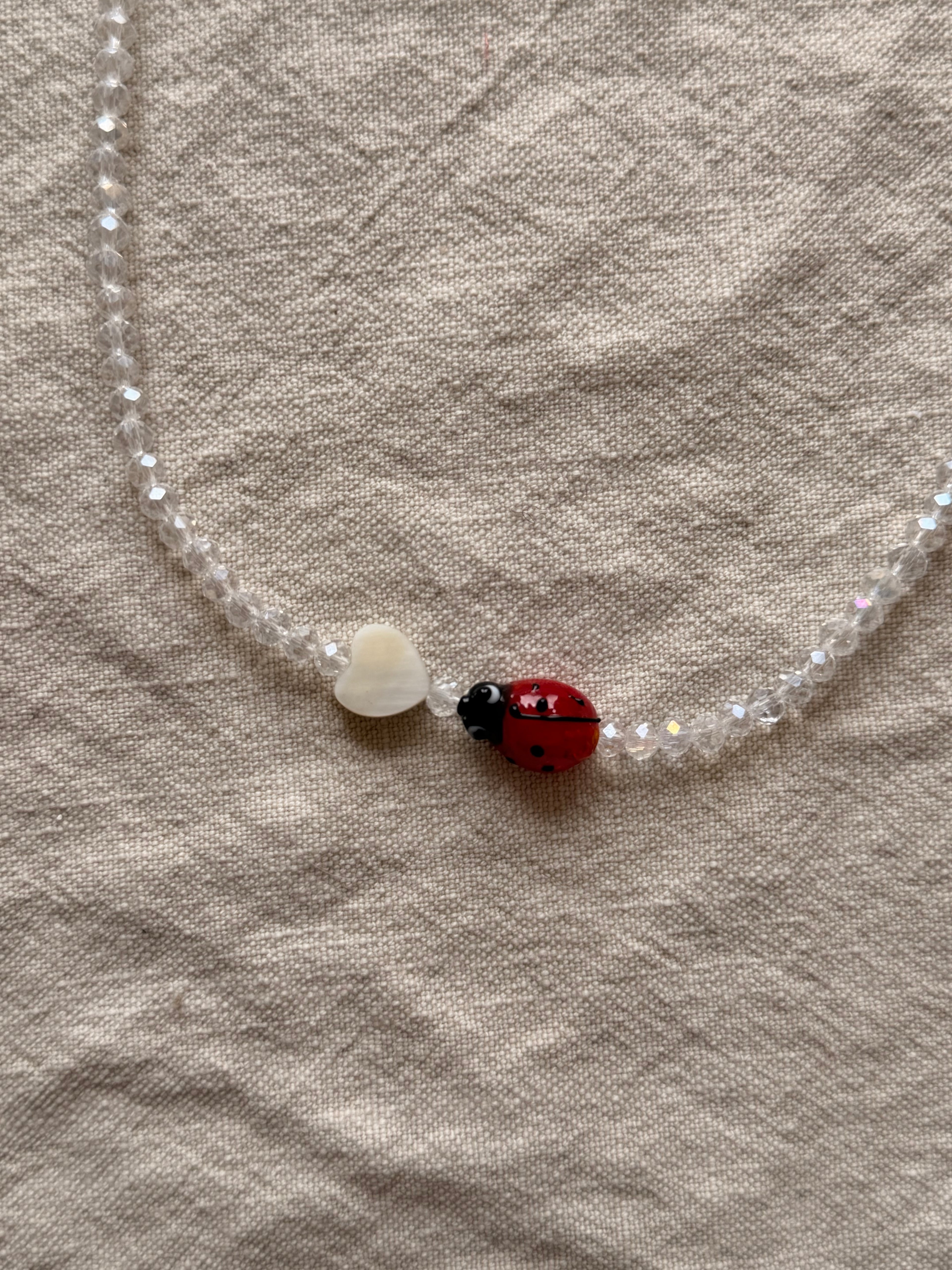Clear glass ladybug necklace
