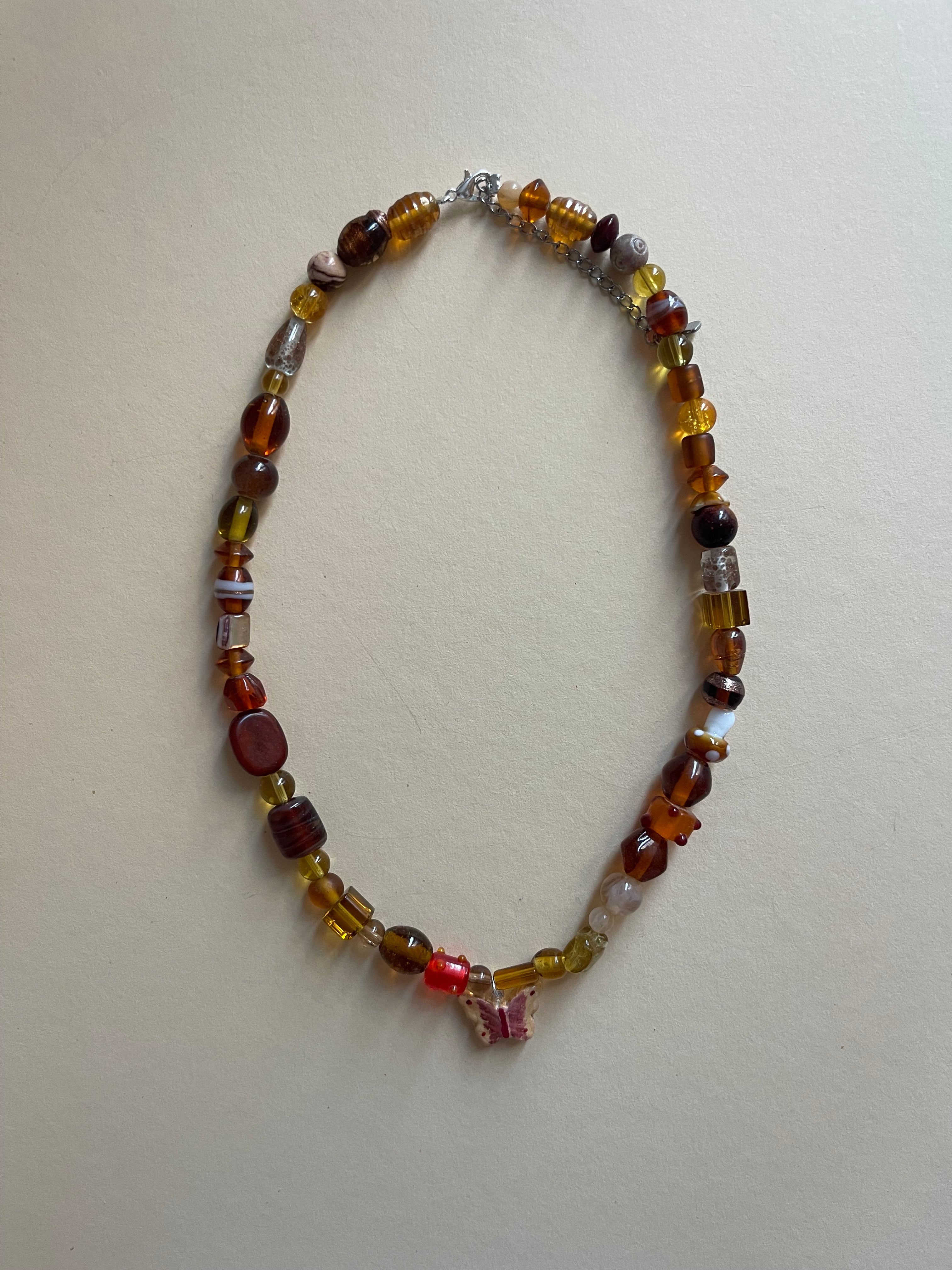 Neutral butterfly necklace