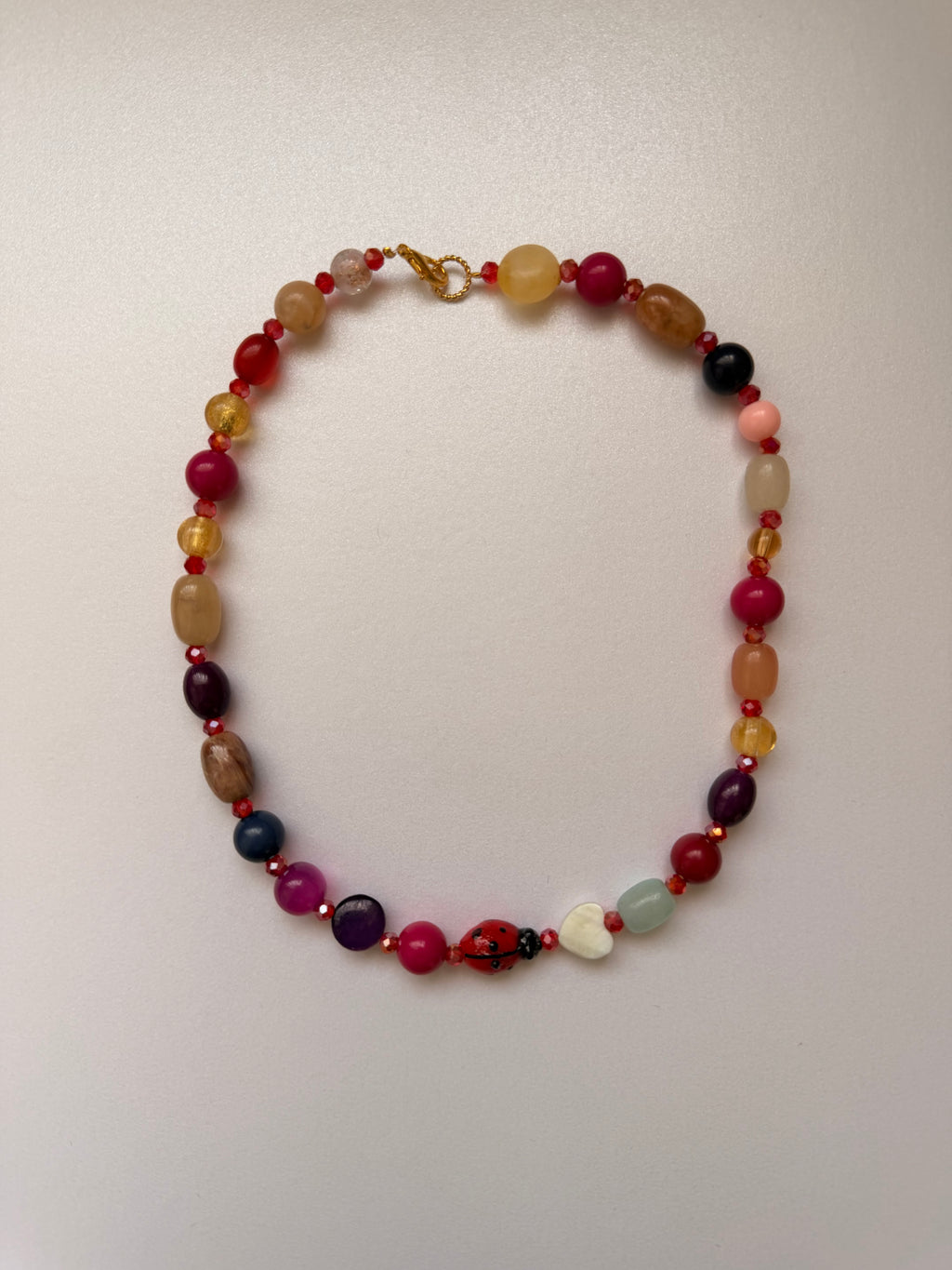Multi colour ladybug necklace