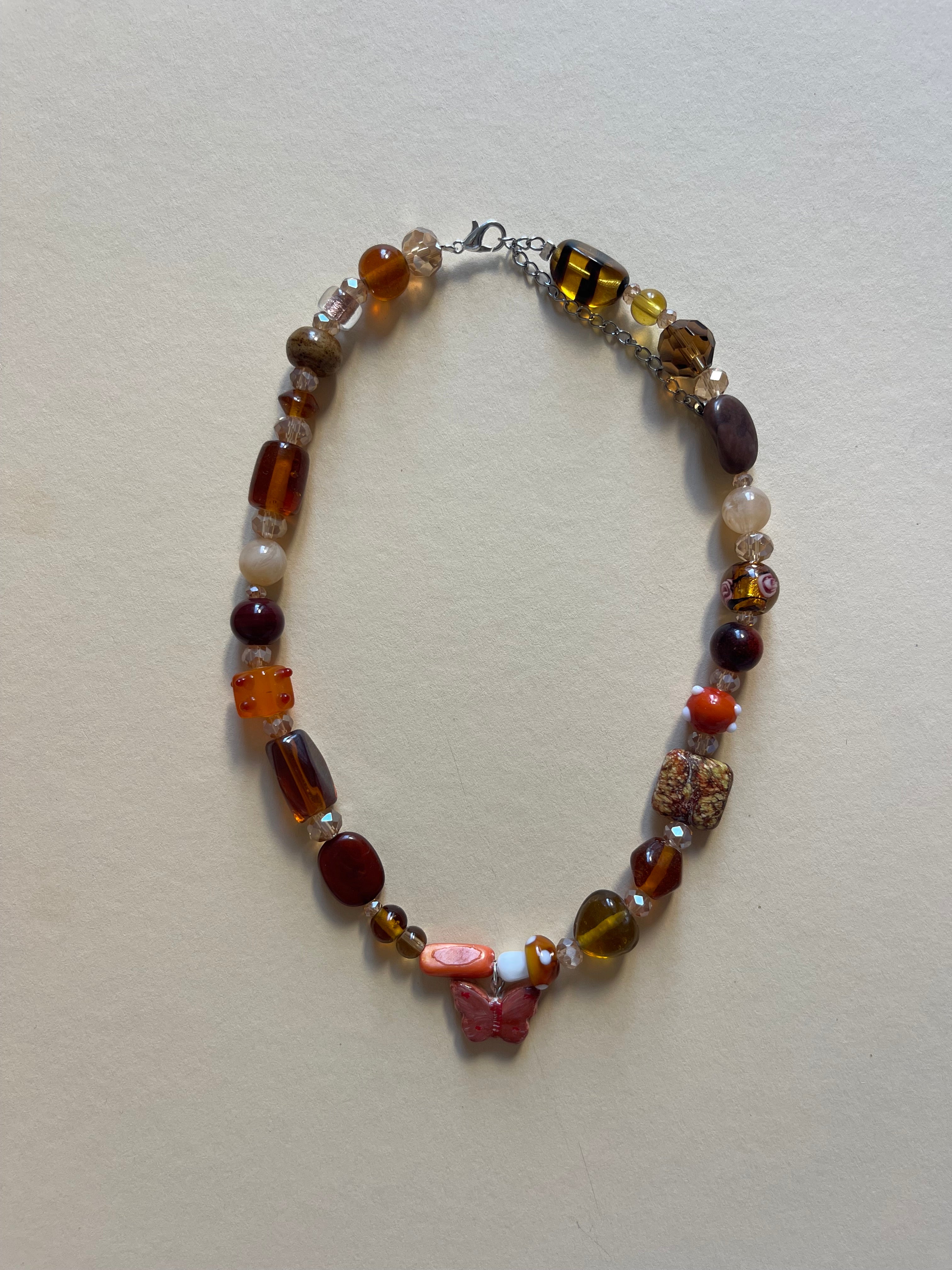 Warm tone butterfly necklace