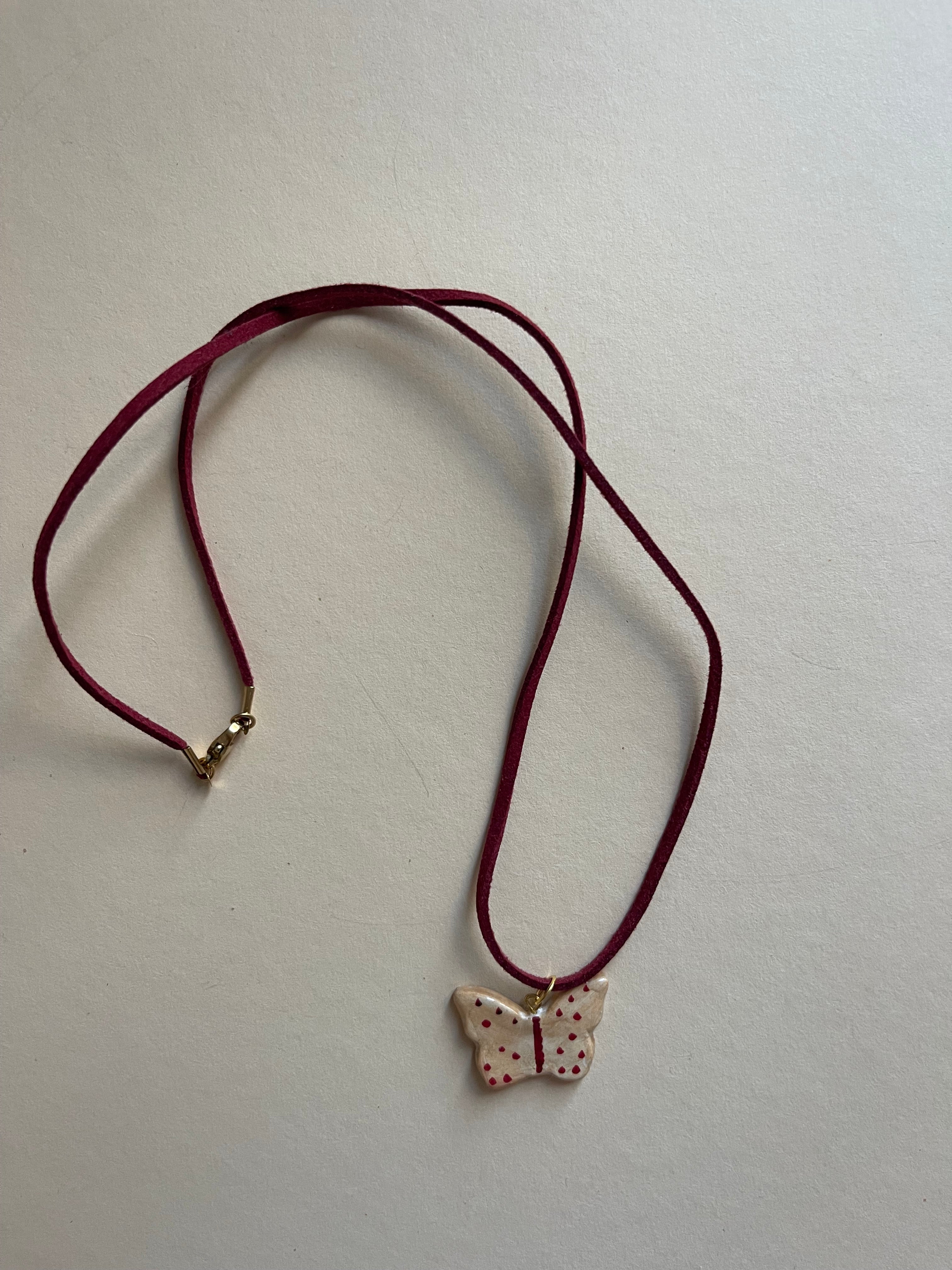 Polka dot butterfly on leather