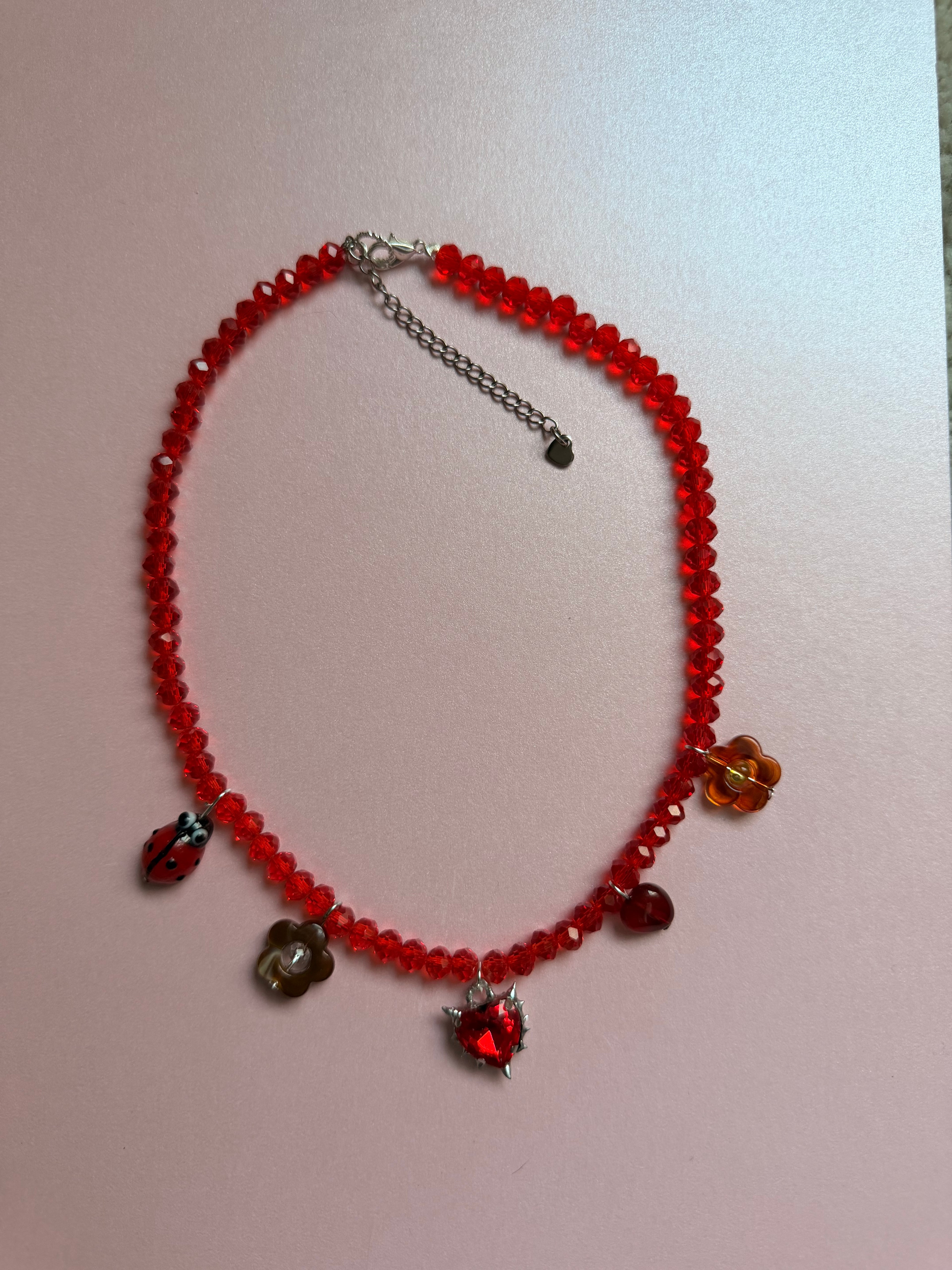 Red charm necklace