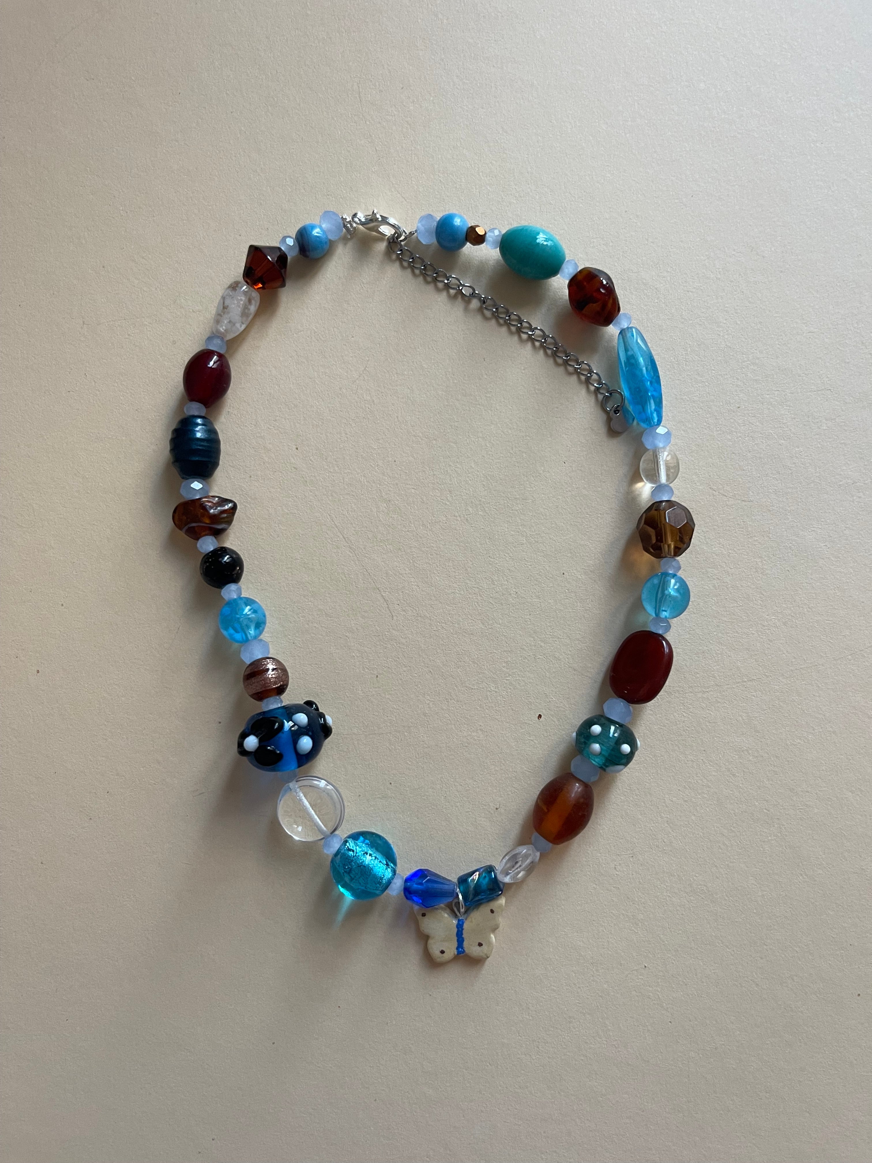 Blue/brown butterfly necklace