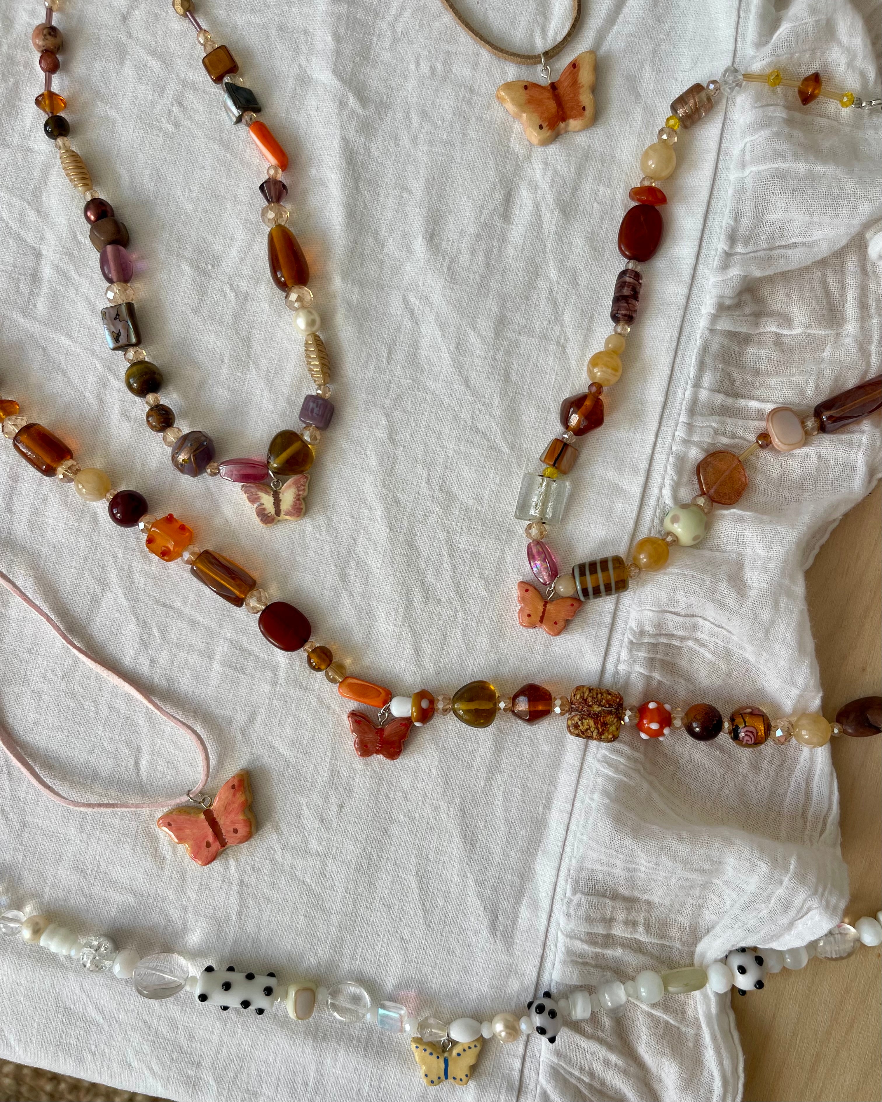 Warm tone butterfly necklace