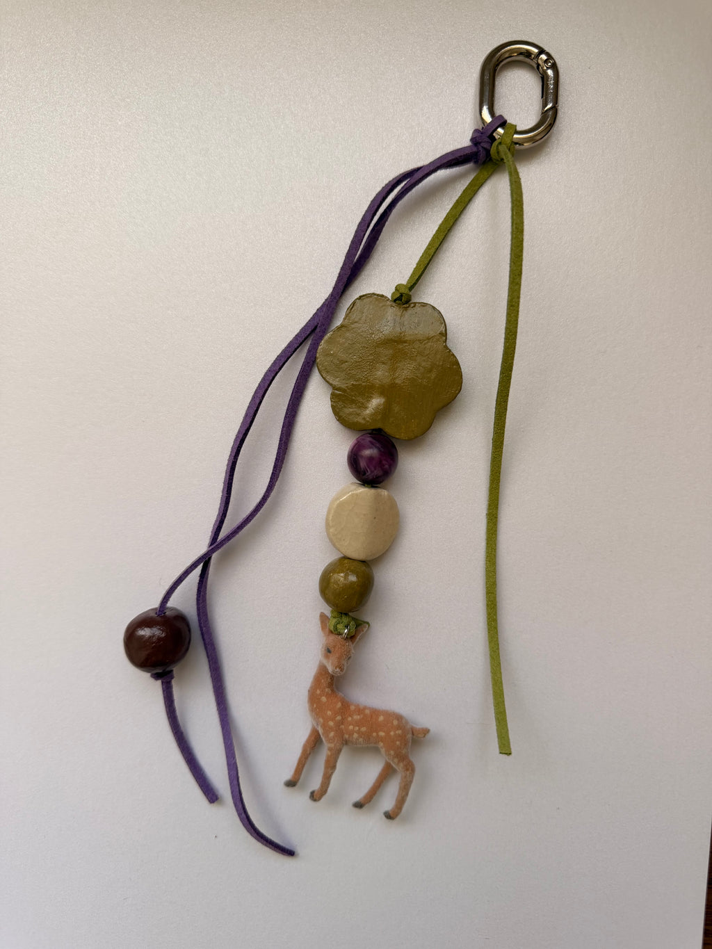 Purple and green deer bag charm