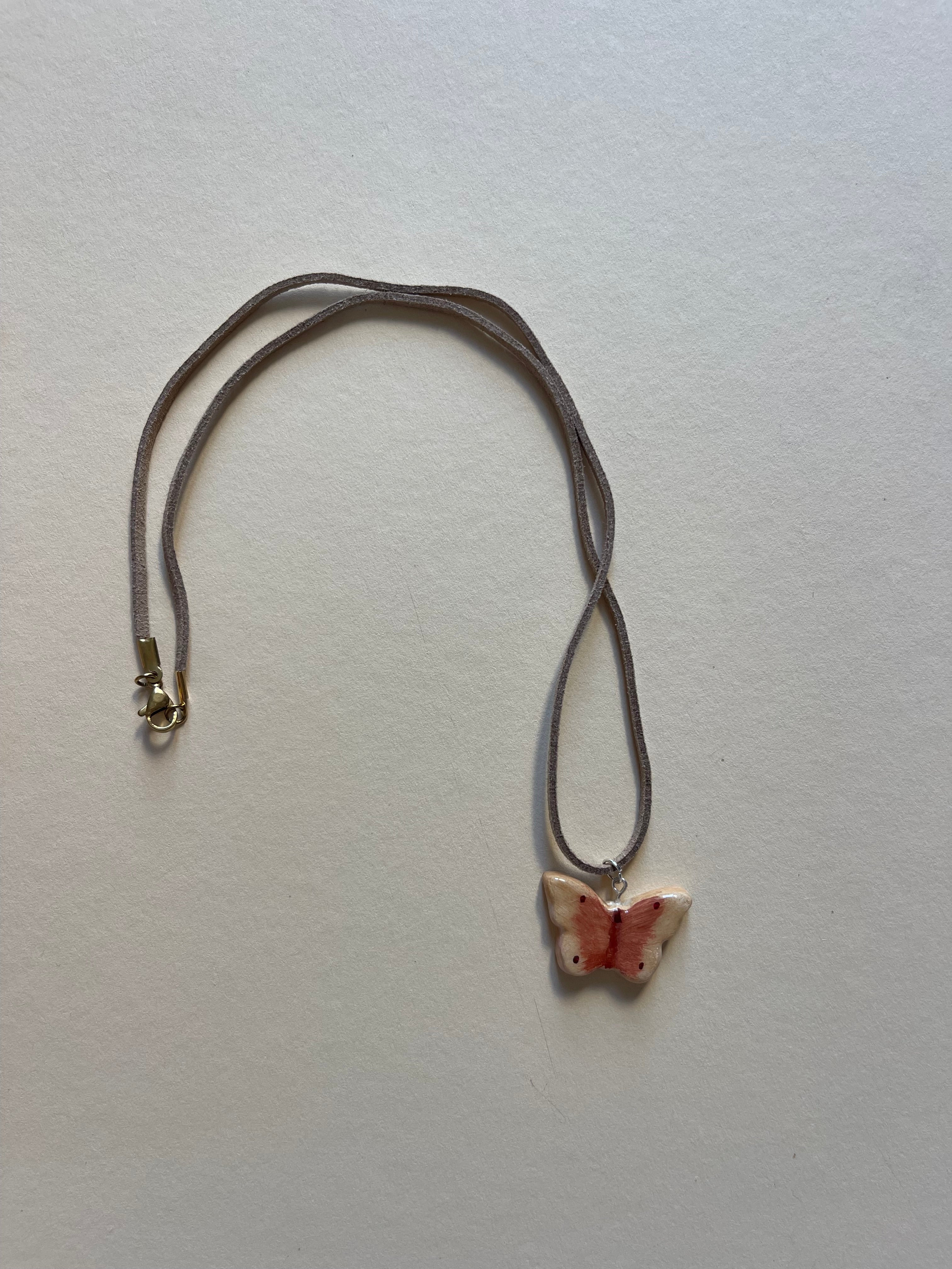 Light brown butterfly on leather