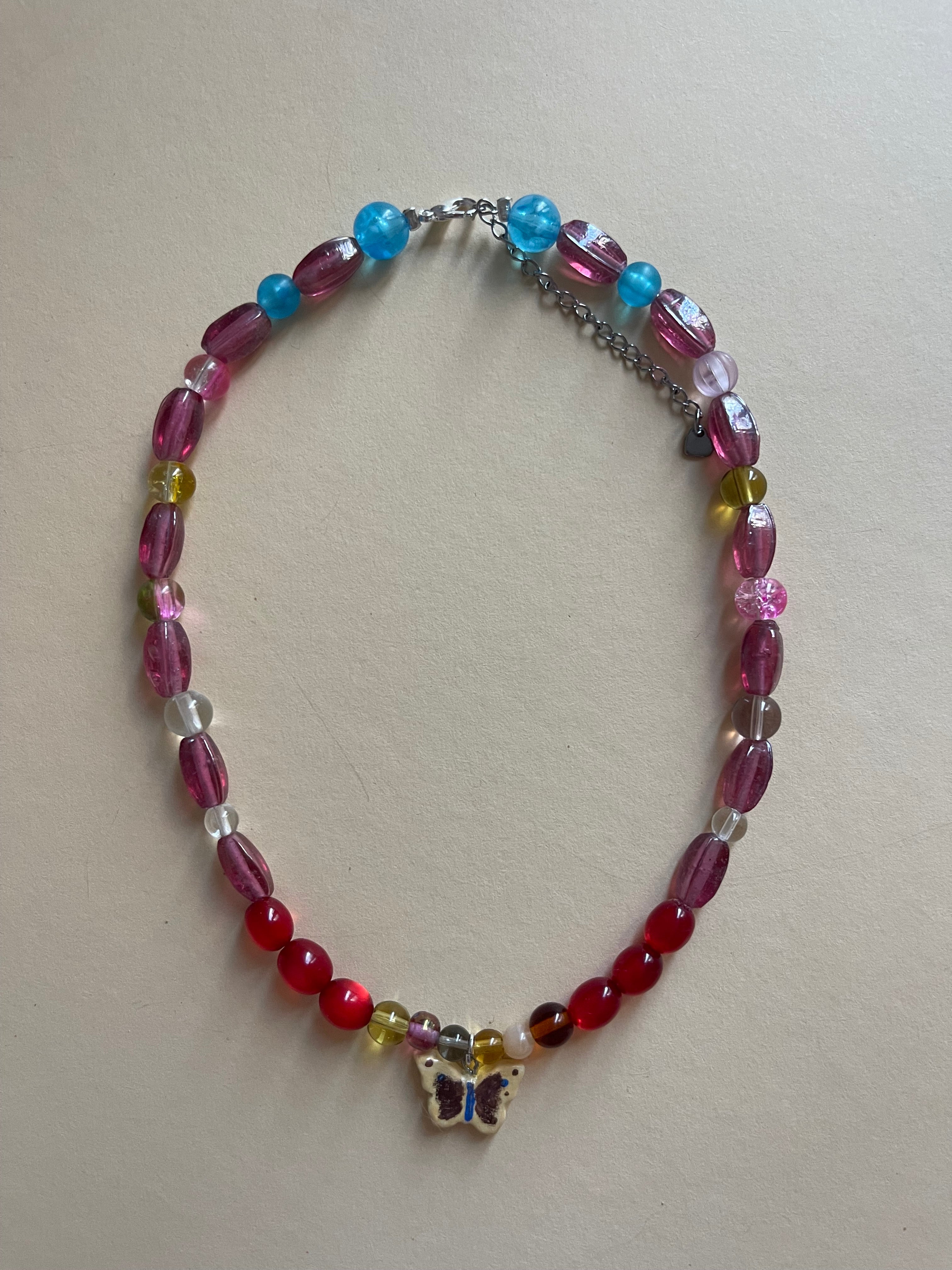 Red/pink/blue tone butterfly necklace
