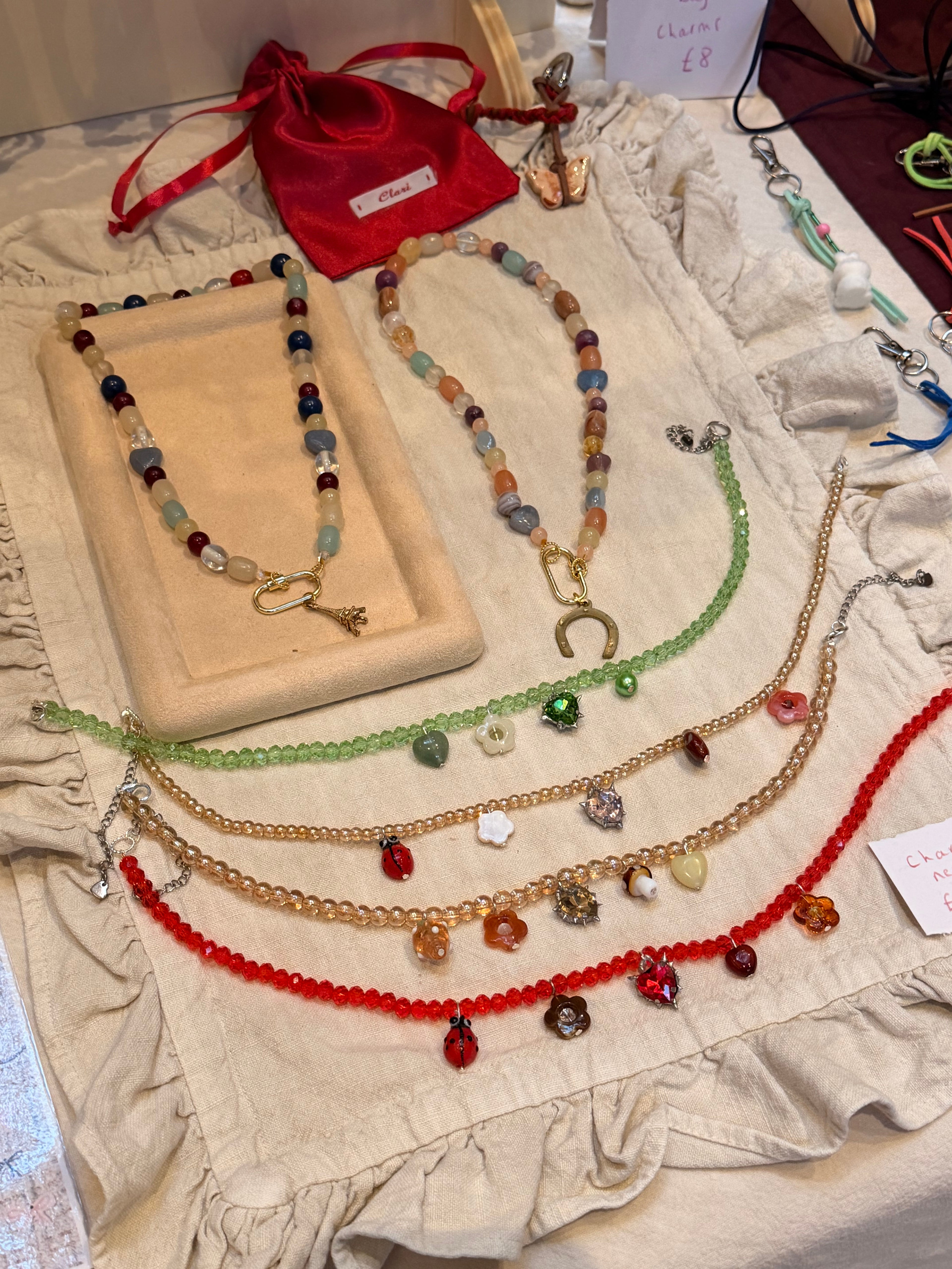 Green charm necklace